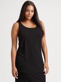 An elegant and modern layering piece in flowy stretch silk jersey.Scoopneck Wide straps About 30 from shoulder to hem Silk Hand wash Imported An elegant and modern layering piece in flowy stretch silk jersey.Scoopneck Wide straps About 30 from shoulder to hem Silk Hand wash Imported