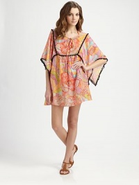 A lively print meets playful pom-pom details and a relaxed silhouette, making this a perfect coverup.Self-tie detail at necklineCord endsKimono sleevesContrast pom-pom trim74% cotton/26% silkDry cleanMade in USA of imported fabric A lively print meets playful pom-pom details and a relaxed silhouette, making this a perfect coverup.Self-tie detail at necklineCord endsKimono sleevesContrast pom-pom trim74% cotton/26% silkDry cleanMade in USA of imported fabric
