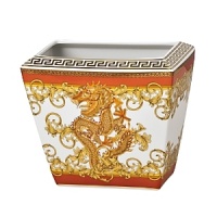 The most legendary figure of Asian mythology, the red dragon rises majestically from this fabulously opulent dinnerware from Rosenthal Meets Versace, conveying all its might and glory. Each piece features ornate golden baroque patterns and four small medallions representing the sun, and the Versace medusa decorates the background. The most legendary figure of Asian mythology, the red dragon rises majestically from this fabulously opulent dinnerware from Rosenthal Meets Versace, conveying all its might and glory. Each piece features ornate golden baroque patterns and four small medallions representing the sun, and the Versace medusa decorates the background.