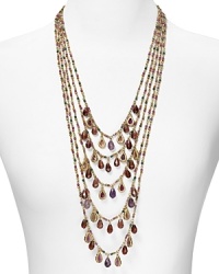 Strands of shimmering glass beads are newly dramatic on this five row Lauren Ralph Lauren necklace, accented by a simple pleated metal chain.