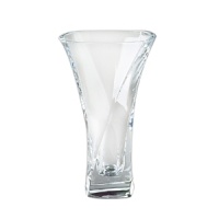 Exuding the grace of a ballet dancer, the Piroett Vase brims with artistic flair as well as tall flower bouquets. Artist Lisa Smith designed the full-lead crystal piece with a square rim and undercut sides that seem to be unfurling as they spin up and off the heavy, square base. Exuding the grace of a ballet dancer, the Piroett Vase brims with artistic flair as well as tall flower bouquets. Artist Lisa Smith designed the full-lead crystal piece with a square rim and undercut sides that seem to be unfurling as they spin up and off the heavy, square base.