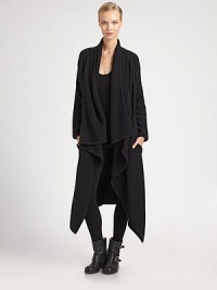 Artfully draped, panel constructed cashmere, in a modern, slouchy silhouette.Shawl collarAsymmetrical front drapeLong sleevesSide slash pocketsAbout 50 from shoulder to hemCashmereDry cleanImported of Italian fabricModel shown is 5'11 (180cm) wearing US size Small.This style runs true to size. We recommend ordering your usual size for a standard fit. Artfully draped, panel constructed cashmere, in a modern, slouchy silhouette.Shawl collarAsymmetrical front drapeLong sleevesSide slash pocketsAbout 50 from shoulder to hemCashmereDry cleanImported of Italian fabricModel shown is 5'11 (180cm) wearing US size Small.This style runs true to size. We recommend ordering your usual size for a standard fit.