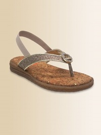 A sparkle thong strap on a cork-lined footbed, delightfully adorned with a rhinestone signature medallion.Sparkle fabric upperRhinestone medallionMetallic faux leather pipingBack elastic strap for easy fitPadded insoleComposite rubber soleCork footbedImported A sparkle thong strap on a cork-lined footbed, delightfully adorned with a rhinestone signature medallion.Sparkle fabric upperRhinestone medallionMetallic faux leather pipingBack elastic strap for easy fitPadded insoleComposite rubber soleCork footbedImported
