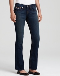Cut a classic silhouette in these lightly faded True Religion Petite jeans, complete with the brand's iconic back flap pockets Cut a classic silhouette in these lightly faded True Religion Petite jeans, complete with the brand's iconic back flap pockets