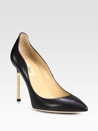 Edgy metal studs line the stiletto heel of this leather point toe pump. Metal heel with studs, 4 (100mm)Leather upperPoint toeLeather lining and solePadded insoleMade in Italy Edgy metal studs line the stiletto heel of this leather point toe pump. Metal heel with studs, 4 (100mm)Leather upperPoint toeLeather lining and solePadded insoleMade in Italy