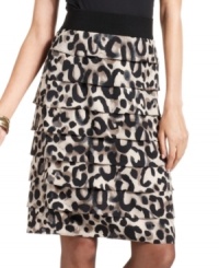 Alfani's latest skirt has plenty of personality with a bold animal print and tiered silhouette. Alfani's latest skirt has plenty of personality with a bold animal print and tiered silhouette.