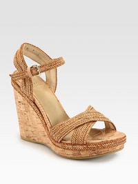 Braided leather straps rest on an earthy cork wedge and platform, concluding with an adjustable slingback. Cork wedge, 4½ (115mm)Cork platform, 1 (25mm)Compares to a 3½ heel (90mm)Cork and leather upperLeather liningRubber solePadded insoleImportedOUR FIT MODEL RECOMMENDS ordering true size. Braided leather straps rest on an earthy cork wedge and platform, concluding with an adjustable slingback. Cork wedge, 4½ (115mm)Cork platform, 1 (25mm)Compares to a 3½ heel (90mm)Cork and leather upperLeather liningRubber solePadded insoleImportedOUR FIT MODEL RECOMMENDS ordering true size.