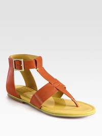 Luscious leather gladiator with a thong front and an adjustable ankle strap. Leather upperLeather liningRubber solePadded insoleImportedOUR FIT MODEL RECOMMENDS ordering true size. Luscious leather gladiator with a thong front and an adjustable ankle strap. Leather upperLeather liningRubber solePadded insoleImportedOUR FIT MODEL RECOMMENDS ordering true size.