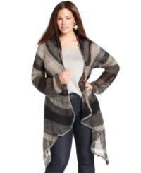Cozy up in cooler weather with Lucky Brand Jeans' long sleeve plus size cardigan, punctuated by a handkerchief hem. Cozy up in cooler weather with Lucky Brand Jeans' long sleeve plus size cardigan, punctuated by a handkerchief hem.