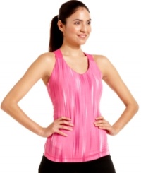 Get active in this easy crossback tank top from Ideology. A colorful print adds style; a built-in shelf bra lends support! Get active in this easy crossback tank top from Ideology. A colorful print adds style; a built-in shelf bra lends support!