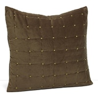 A rich, soft velvet coverlet and shams exude luxury. Light green cross stitches highlight the olive quilted grid pattern. A rich, soft velvet coverlet and shams exude luxury. Light green cross stitches highlight the olive quilted grid pattern.