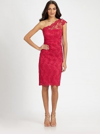Delicately embroidered floral lace, in an asymmetrical style with prettily scalloped edges.Asymmetrical necklineSingle cap sleeveScalloped edgesConcealed side zipFully linedAbout 24 from natural waistPolyesterDry cleanMade in USA of imported fabricModel shown is 5'10½ (179cm) wearing US size 4. Delicately embroidered floral lace, in an asymmetrical style with prettily scalloped edges.Asymmetrical necklineSingle cap sleeveScalloped edgesConcealed side zipFully linedAbout 24 from natural waistPolyesterDry cleanMade in USA of imported fabricModel shown is 5'10½ (179cm) wearing US size 4.