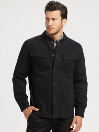 Featuring a classic button-down shirt silhouette, this stand-collar cotton jacket offers laid-back style.Stand collarSnap frontFront pocketsStylish back yokeAbout 28 from shoulder to hemCottonMachine washImported of domestic fabric