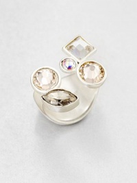 Wear this reversible ring with the multi-sized, multi-shaped crystals on top, or spin it around so all that shows is its wide, smooth silvery band.CrystalSilvertone-finished brassMade in Italy Wear this reversible ring with the multi-sized, multi-shaped crystals on top, or spin it around so all that shows is its wide, smooth silvery band.CrystalSilvertone-finished brassMade in Italy