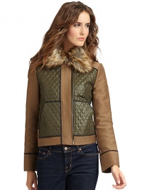 THE LOOKAllover quilted constructionRemovable faux fur trim at collarFront zip closureAngled pouch pocketsTHE FITAbout 20 from shoulder to hemTHE MATERIALBody: polyester/nylonSecond fabric: cotton/silkThird fabric: rayon/nylon/spandexFourth fabric: polyesterFully linedCARE & ORIGINDry cleanImportedModel shown is 5'8 (172½cm) wearing US size Small. THE LOOKAllover quilted constructionRemovable faux fur trim at collarFront zip closureAngled pouch pocketsTHE FITAbout 20 from shoulder to hemTHE MATERIALBody: polyester/nylonSecond fabric: cotton/silkThird fabric: rayon/nylon/spandexFourth fabric: polyesterFully linedCARE & ORIGINDry cleanImportedModel shown is 5'8 (172½cm) wearing US size Small.