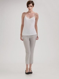 Gentle cotton design with a slender fit and contrast trim includes adjustable straps. Pullover style Sleeveless Adjustable straps V neckline Cotton; dry clean Imported Gentle cotton design with a slender fit and contrast trim includes adjustable straps. Pullover style Sleeveless Adjustable straps V neckline Cotton; dry clean Imported