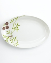 A thoroughly modern beauty, the Garden Glimmer oval platter from Martha Stewart Collection balances smart and striking design with a stylized botanical pattern in ultra-sturdy porcelain. (Clearance) A thoroughly modern beauty, the Garden Glimmer oval platter from Martha Stewart Collection balances smart and striking design with a stylized botanical pattern in ultra-sturdy porcelain. (Clearance)