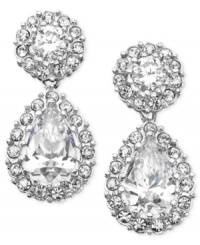 These chandelier-like pear drop earrings will add glowing sophistication to your wardrobe. Cubic zirconia accents set in rhodium-plated silvertone mixed metal. Each measures approximately 3/4 inch. These chandelier-like pear drop earrings will add glowing sophistication to your wardrobe. Cubic zirconia accents set in rhodium-plated silvertone mixed metal. Each measures approximately 3/4 inch.