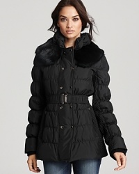 A lush rabbit fur collar tops this diamond-quilted puffer coat from Via Spiga. An elasticized belt cinches the waist for a flattering silhouette. A lush rabbit fur collar tops this diamond-quilted puffer coat from Via Spiga. An elasticized belt cinches the waist for a flattering silhouette.