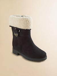Velvety faux suede with fluffy faux shearling offers wintry warmth and comfort.Faux suede upperFaux shearling cuffMicrosuede liningPadded insoleRubber composite tread soleImported Velvety faux suede with fluffy faux shearling offers wintry warmth and comfort.Faux suede upperFaux shearling cuffMicrosuede liningPadded insoleRubber composite tread soleImported