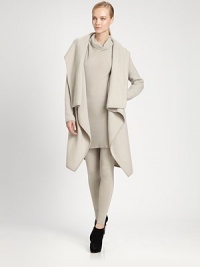 Soft boiled cashmere, generously draped down the front for a look that's as effortless as it is sophisticated.HoodDraped necklineLong sleevesOpen frontAsymmetric hemAbout 43 from shoulder to hemCashmereDry cleanImported of Italian fabricModel shown is 5'11 (180cm) wearing US size Small. Soft boiled cashmere, generously draped down the front for a look that's as effortless as it is sophisticated.HoodDraped necklineLong sleevesOpen frontAsymmetric hemAbout 43 from shoulder to hemCashmereDry cleanImported of Italian fabricModel shown is 5'11 (180cm) wearing US size Small.