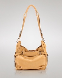 Adopt a free spirited approach to accessorizing with this vintage-inspired shoulder bag from Kooba. In ultra-soft camel leather, it lends daytime looks a distinctive, bohemian vibe. Adopt a free spirited approach to accessorizing with this vintage-inspired shoulder bag from Kooba. In ultra-soft camel leather, it lends daytime looks a distinctive, bohemian vibe.