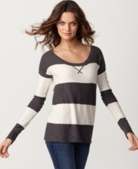 Top off a casual pair of jeans with Kensie's striped sweater. Laid-back with a slim silhouette, this closet staple easily transitions from daytime to date night. Top off a casual pair of jeans with Kensie's striped sweater. Laid-back with a slim silhouette, this closet staple easily transitions from daytime to date night.