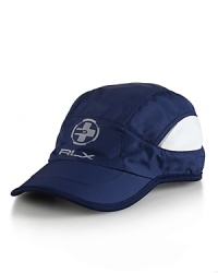 The sleek Pinnacle sport cap is designed from water-repellent taffeta with moisture-wicking mesh insets for maximum breathability during athletic performances.