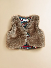 Baby's first faux fur vest reverses to a brilliantly printed corduroy design.V-neckSleevelessFront buttonCottonMachine wash or dry cleanMade in France of imported fabric Baby's first faux fur vest reverses to a brilliantly printed corduroy design.V-neckSleevelessFront buttonCottonMachine wash or dry cleanMade in France of imported fabric