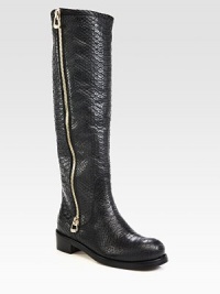 A long exposed zipper lines this tall silhouette, impeccably crafted of rich snake-embossed leather. Stacked heel, 1½ (40mm)Shaft, 16½Leg circumference, 14½Snake-embossed leather upperSide zipLeather liningRubber solePadded insoleMade in Italy A long exposed zipper lines this tall silhouette, impeccably crafted of rich snake-embossed leather. Stacked heel, 1½ (40mm)Shaft, 16½Leg circumference, 14½Snake-embossed leather upperSide zipLeather liningRubber solePadded insoleMade in Italy