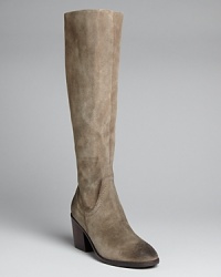Kelsi Dagger defines a basic tall boot design by crafting it in rugged, oiled, distressed suede. It's a good vintage. Kelsi Dagger defines a basic tall boot design by crafting it in rugged, oiled, distressed suede. It's a good vintage.