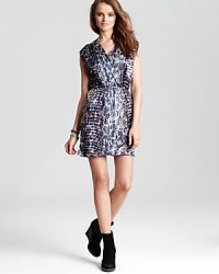 Strut your stuff in this spot-on Aqua dress flaunting an abstract animal print for fiercely feminine style. Strut your stuff in this spot-on Aqua dress flaunting an abstract animal print for fiercely feminine style.