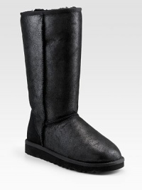 Distressed leather style with soft, shearling lining. Shaft, 9 Leg circumference, 14 Shearling padded insole ImportedOUR FIT MODEL RECOMMENDS ordering true whole size; ½ sizes should order the next whole size up. Distressed leather style with soft, shearling lining. Shaft, 9 Leg circumference, 14 Shearling padded insole ImportedOUR FIT MODEL RECOMMENDS ordering true whole size; ½ sizes should order the next whole size up.