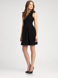 An exquisite wool crepe dress featuring a classic silhouette, complemented by striking (and detachable bows) and a box-pleat skirt.Round neckSleevelessRemovable bowsBust dartsPrincess seamsPleated skirtSlash pocketsSide zipperFully linedAbout 20 from natural waistWoolDry cleanImported Model shown is 5'10 (177cm) wearing US size 4. An exquisite wool crepe dress featuring a classic silhouette, complemented by striking (and detachable bows) and a box-pleat skirt.Round neckSleevelessRemovable bowsBust dartsPrincess seamsPleated skirtSlash pocketsSide zipperFully linedAbout 20 from natural waistWoolDry cleanImported Model shown is 5'10 (177cm) wearing US size 4.