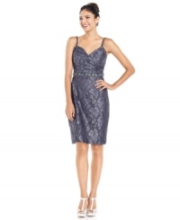 Onyx's lace dress is elevated by a sparkling beaded waistline. Play up the effect with a pair of shimmery metallic heels. Onyx's lace dress is elevated by a sparkling beaded waistline. Play up the effect with a pair of shimmery metallic heels.
