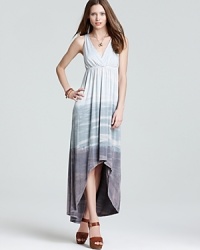 Gypsy 05 defines easy elegance with this summer-perfect dress, boasting a watercolor-inspired print and striking high/low hem. Gypsy 05 defines easy elegance with this summer-perfect dress, boasting a watercolor-inspired print and striking high/low hem.
