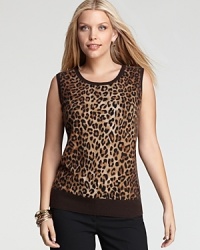 Crisp leopard print leaps from the polished silhouette of a Jones New York Collection Plus cashmere shell for a refined walk on the wild side. Crisp leopard print leaps from the polished silhouette of a Jones New York Collection Plus cashmere shell for a refined walk on the wild side.