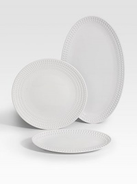 An elegantly detailed platter is made entirely by hand in fine Limoges porcelain with a raised pearl border. From the Perlee White Collection Porcelain 21 X 12½ Dishwasher safe Imported 