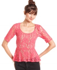A necessary addition to a closet of feminine things, Eyeshadow's short sleeve top mesmerizes with its sheer lace and peplum flare. A necessary addition to a closet of feminine things, Eyeshadow's short sleeve top mesmerizes with its sheer lace and peplum flare.