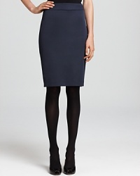 Elegant tailoring creates a sleek silhouette on this Armani Collezioni pencil skirt. Elegant tailoring creates a sleek silhouette on this Armani Collezioni pencil skirt.
