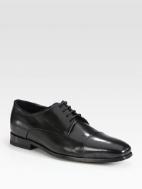 Distinguished leather lace-up with cap-toe finish.Leather upperPadded insoleRubber soleImported Distinguished leather lace-up with cap-toe finish.Leather upperPadded insoleRubber soleImported