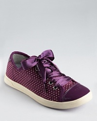 Pretty in polka dots, DKNY's printed Blair sneakers blend the iconic sneaker with dressed up details like ribbon laces and a patent cap toe. Pretty in polka dots, DKNY's printed Blair sneakers blend the iconic sneaker with dressed up details like ribbon laces and a patent cap toe.