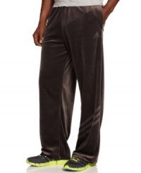 Take to the court in comfort with these velour basketball pants from adidas. Take to the court in comfort with these velour basketball pants from adidas.