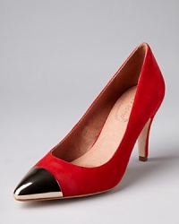 Capture the cap toe trend with Corso Como's suede pumps featuring a metallic pointed toe. Capture the cap toe trend with Corso Como's suede pumps featuring a metallic pointed toe.