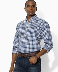 A classic sport shirt is given a sophisticated update in brushed cotton plaid for the ultimate in preppy style. A classic sport shirt is given a sophisticated update in brushed cotton plaid for the ultimate in preppy style.