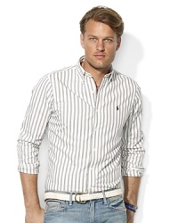 Cut for a trim, modern fit from soft oxford-woven cotton, a handsome long-sleeved sport shirt exudes masculine polish with a sleek striped pattern. Cut for a trim, modern fit from soft oxford-woven cotton, a handsome long-sleeved sport shirt exudes masculine polish with a sleek striped pattern.