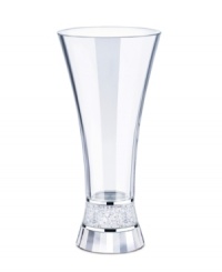 In fine Swarovski crystal, the Crystalline vase radiates pure and brilliant luxury with a fully faceted base and center filled with hundred of sparkling chatons. An elegant accessory with our without flowers, this mesmerizing vessel provides a lifetime of sparkle. In fine Swarovski crystal, the Crystalline vase radiates pure and brilliant luxury with a fully faceted base and center filled with hundred of sparkling chatons. An elegant accessory with our without flowers, this mesmerizing vessel provides a lifetime of sparkle.