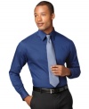 Basic with a little sheen can bolster any look, just like this no-iron, sateen-striped shirt from Van Heusen.