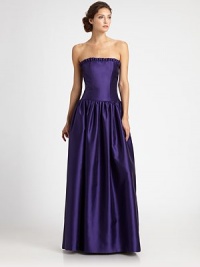 This richly-hued gazar design has a timeless, utterly elegant appeal.Strapless necklineRuffled trimFull skirtConcealed back zipFully linedAbout 44 from natural waistPolyesterDry cleanMade in USA of imported fabricModel shown is 5'11 (180cm) wearing US size 2. This richly-hued gazar design has a timeless, utterly elegant appeal.Strapless necklineRuffled trimFull skirtConcealed back zipFully linedAbout 44 from natural waistPolyesterDry cleanMade in USA of imported fabricModel shown is 5'11 (180cm) wearing US size 2.