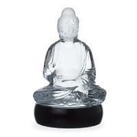 An exquisite, limited edition crystal idol of the Buddha seated in lotus position exudes a meditative calm for a dose of serenity and shimmering opulence. An exquisite, limited edition crystal idol of the Buddha seated in lotus position exudes a meditative calm for a dose of serenity and shimmering opulence.